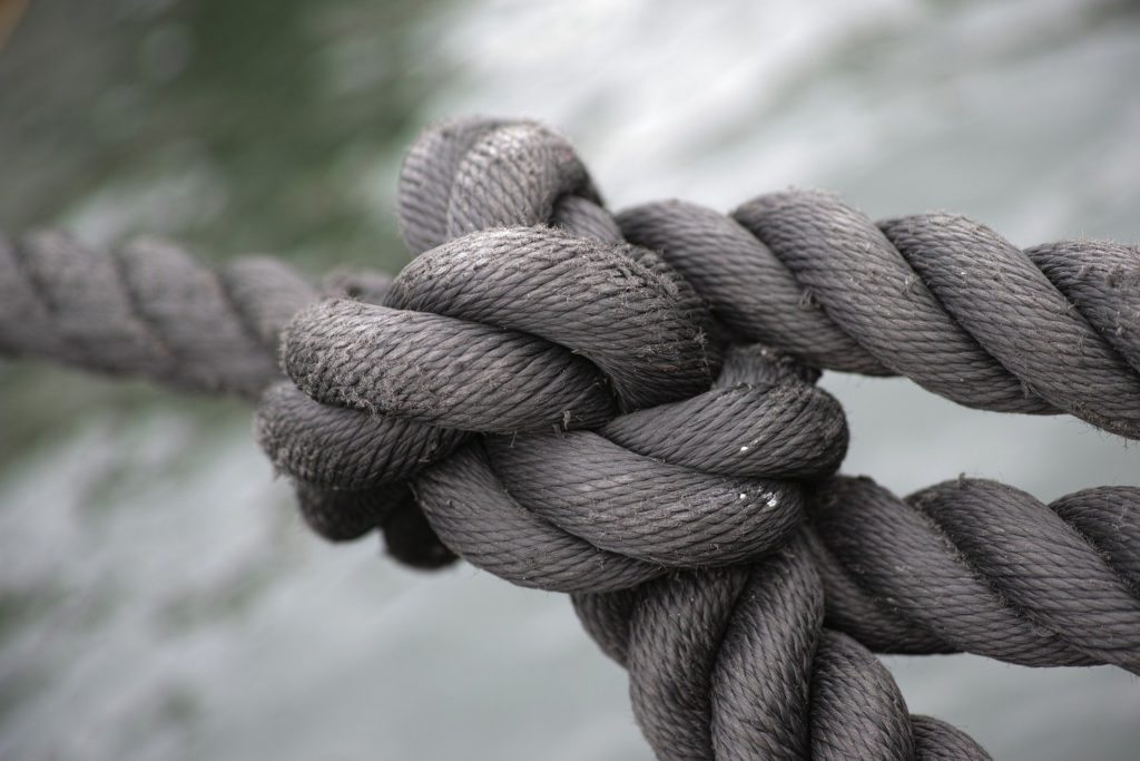 tightly wound ropes in knots